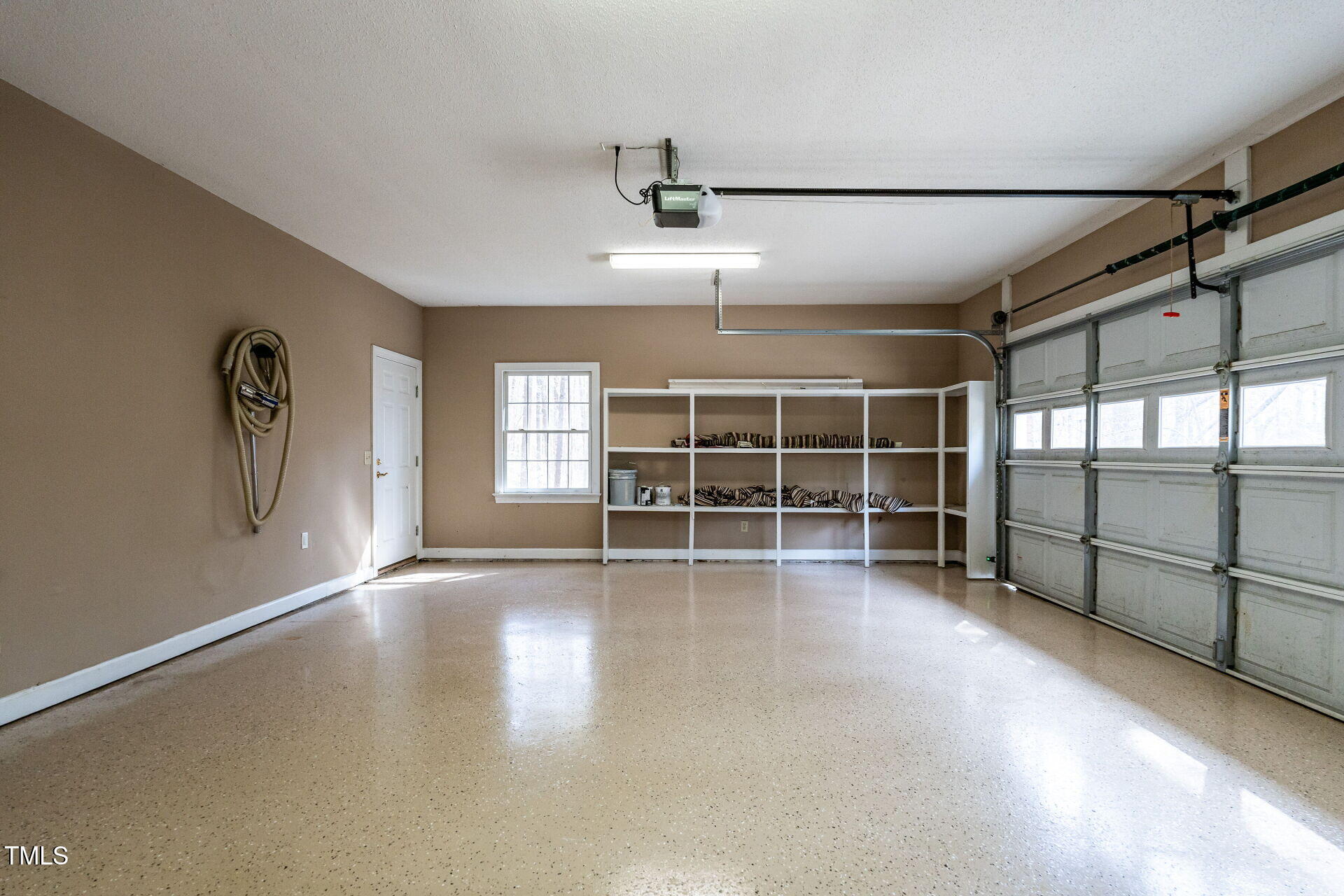 471 Log Barn Road Pittsboro, NC 27312 - Photo 32 of 44 029-1920x1080-garage-interior