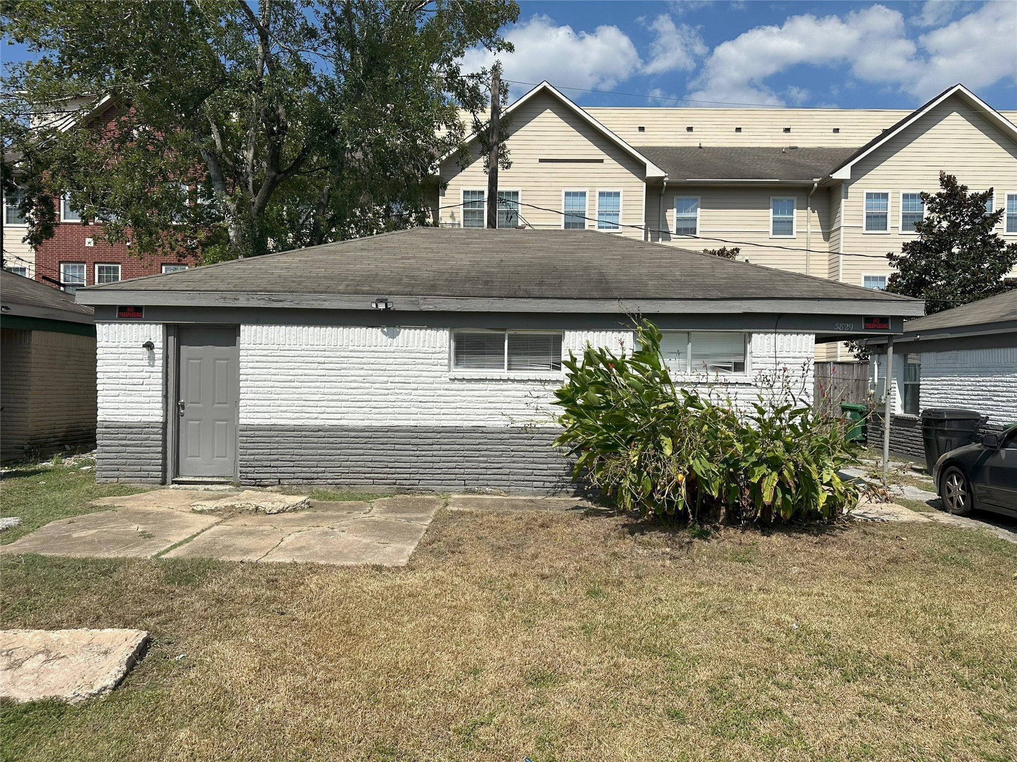 a view of a house with a street