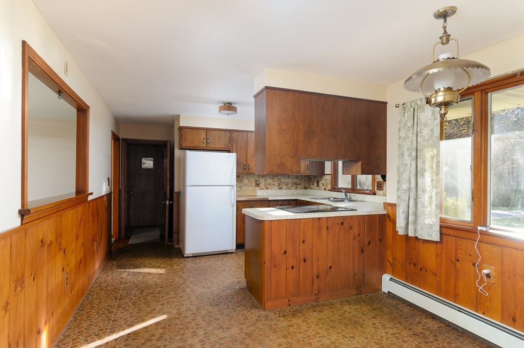 85 Marsh Road Barre, MA 01005 - Photo 16 of 27 a kitchen with a stove a refrigerator and a stove