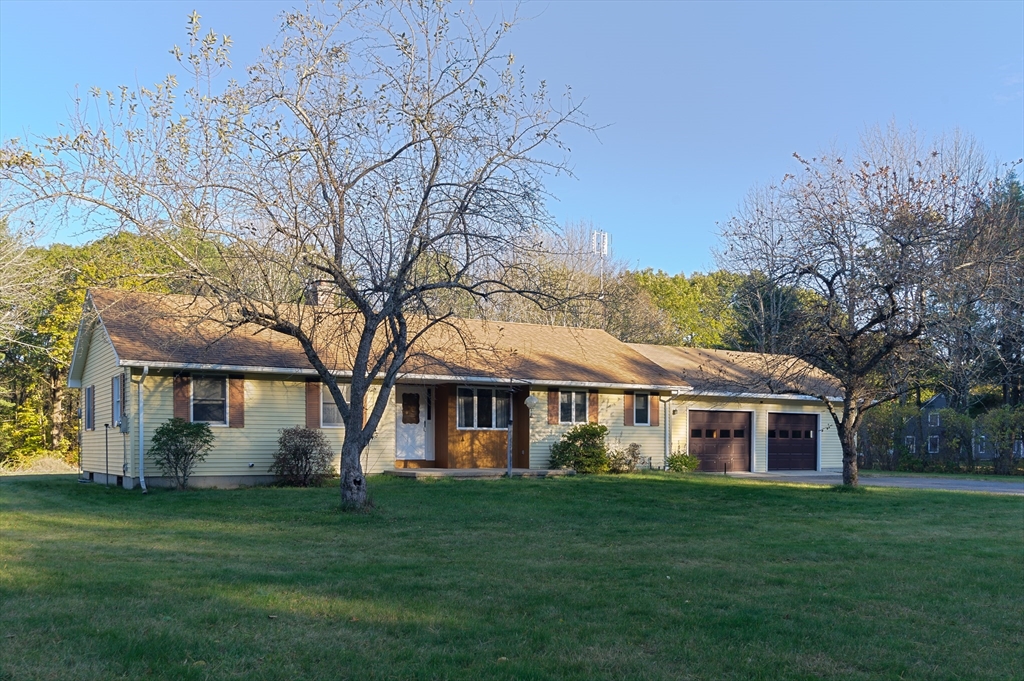 85 Marsh Road Barre, MA 01005 - Photo 3 of 27 a front view of a house with a garden