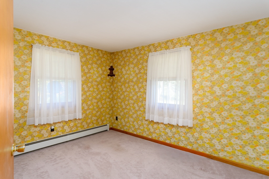 85 Marsh Road Barre, MA 01005 - Photo 6 of 27 a view of an empty room and window
