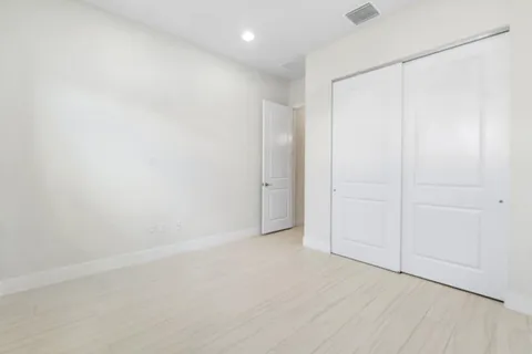 an empty room with an entryway