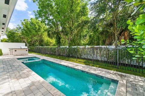 a view of yard with patio