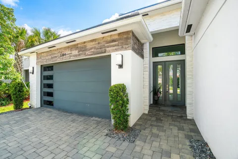 a view of a back yard of the house