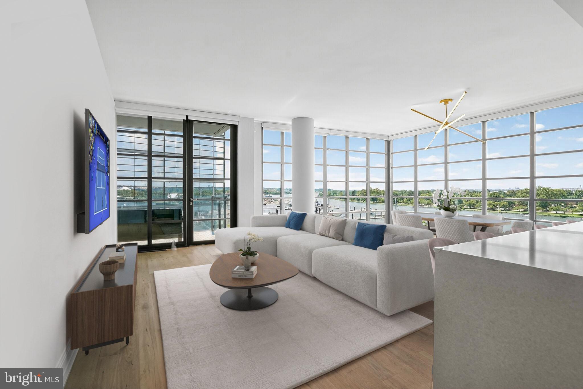 45 Sutton Square Southwest, Unit 509 Washington, DC 20024 - Photo 5 of 26 Expansive dining & living room with terrace