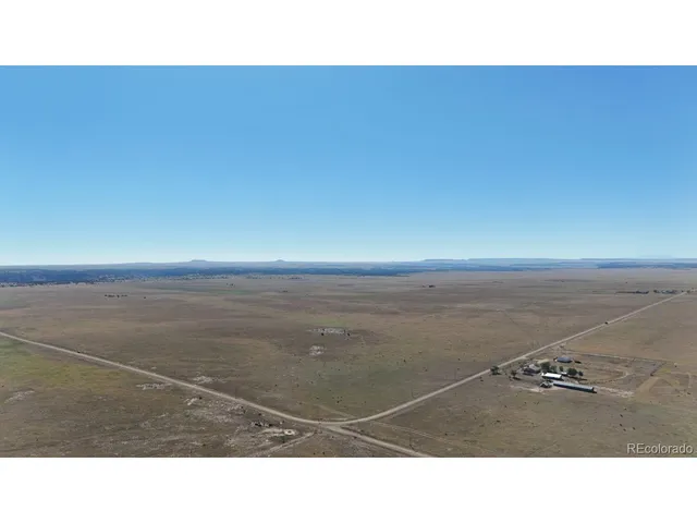 a black and white photo of a field