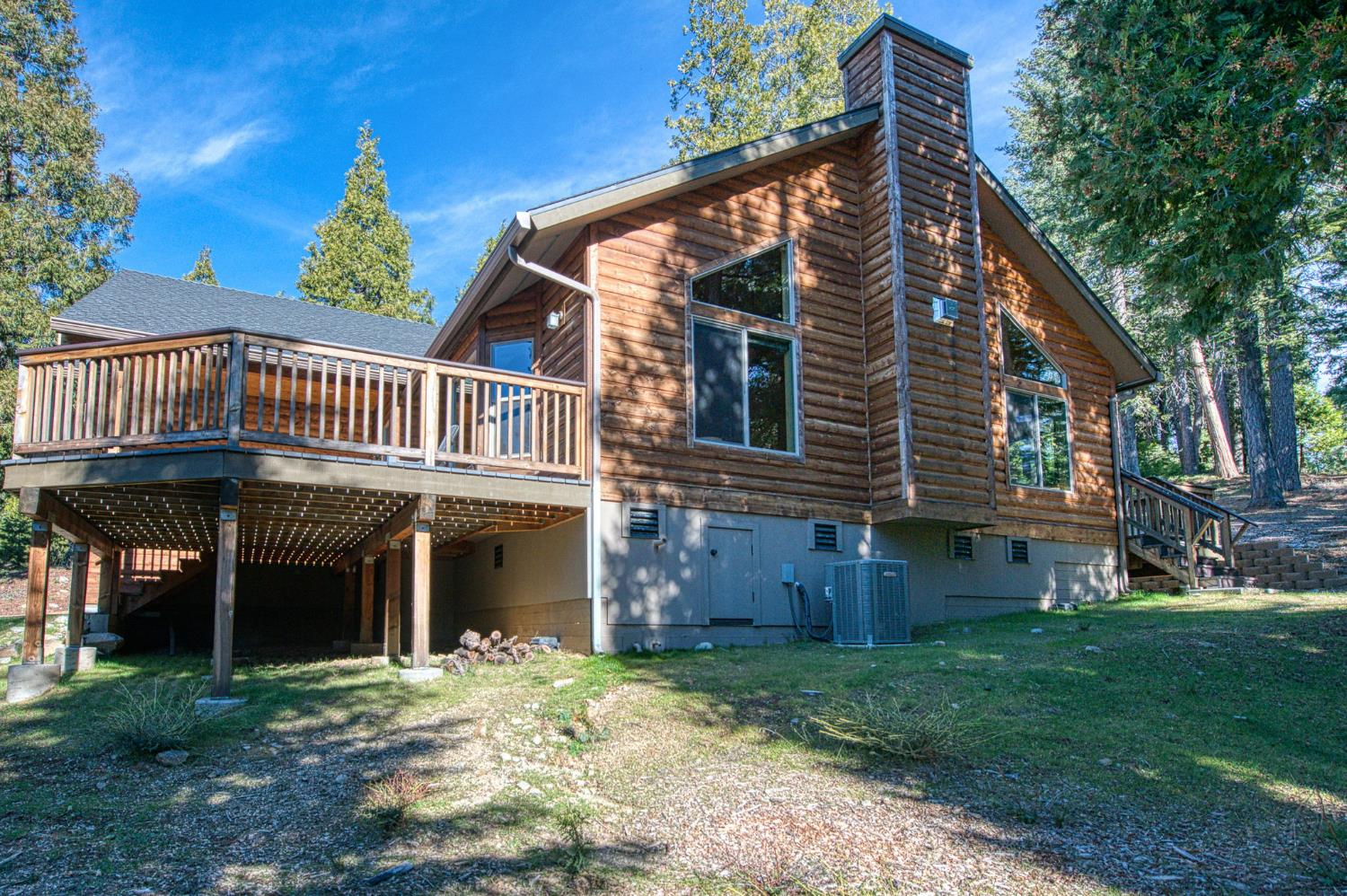 41876 Timber View Lane Shaver Lake, CA 93664 - Photo 15 of 85 a view of a house with a yard