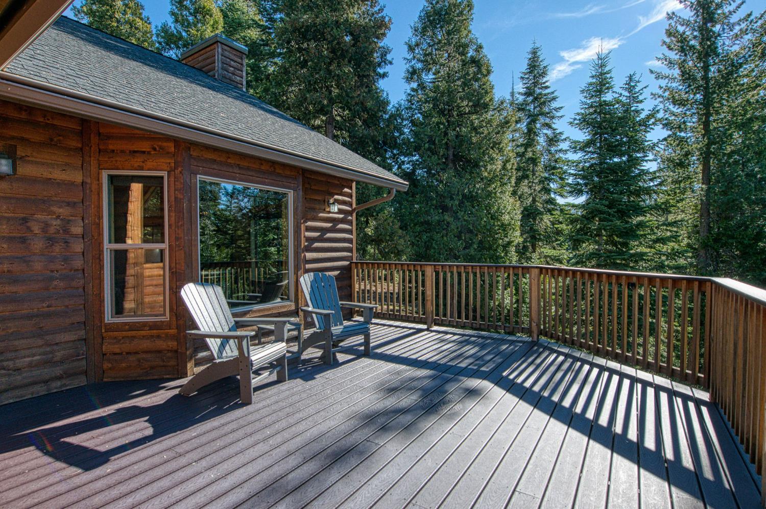 41876 Timber View Lane Shaver Lake, CA 93664 - Photo 18 of 85 a view of backyard with a deck and hardwood floor