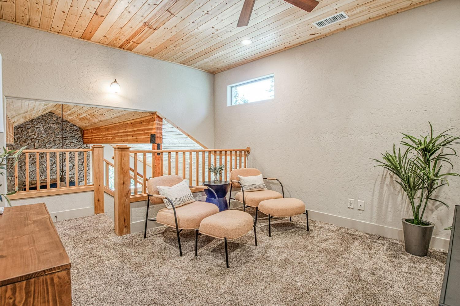 41876 Timber View Lane Shaver Lake, CA 93664 - Photo 58 of 85 a living room with furniture and a potted plant