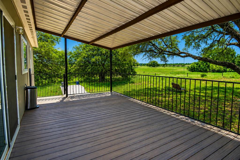 8228 Us Highway Rochelle, TX 76872 - Photo 14 of 36 a view of porch with wooden floor
