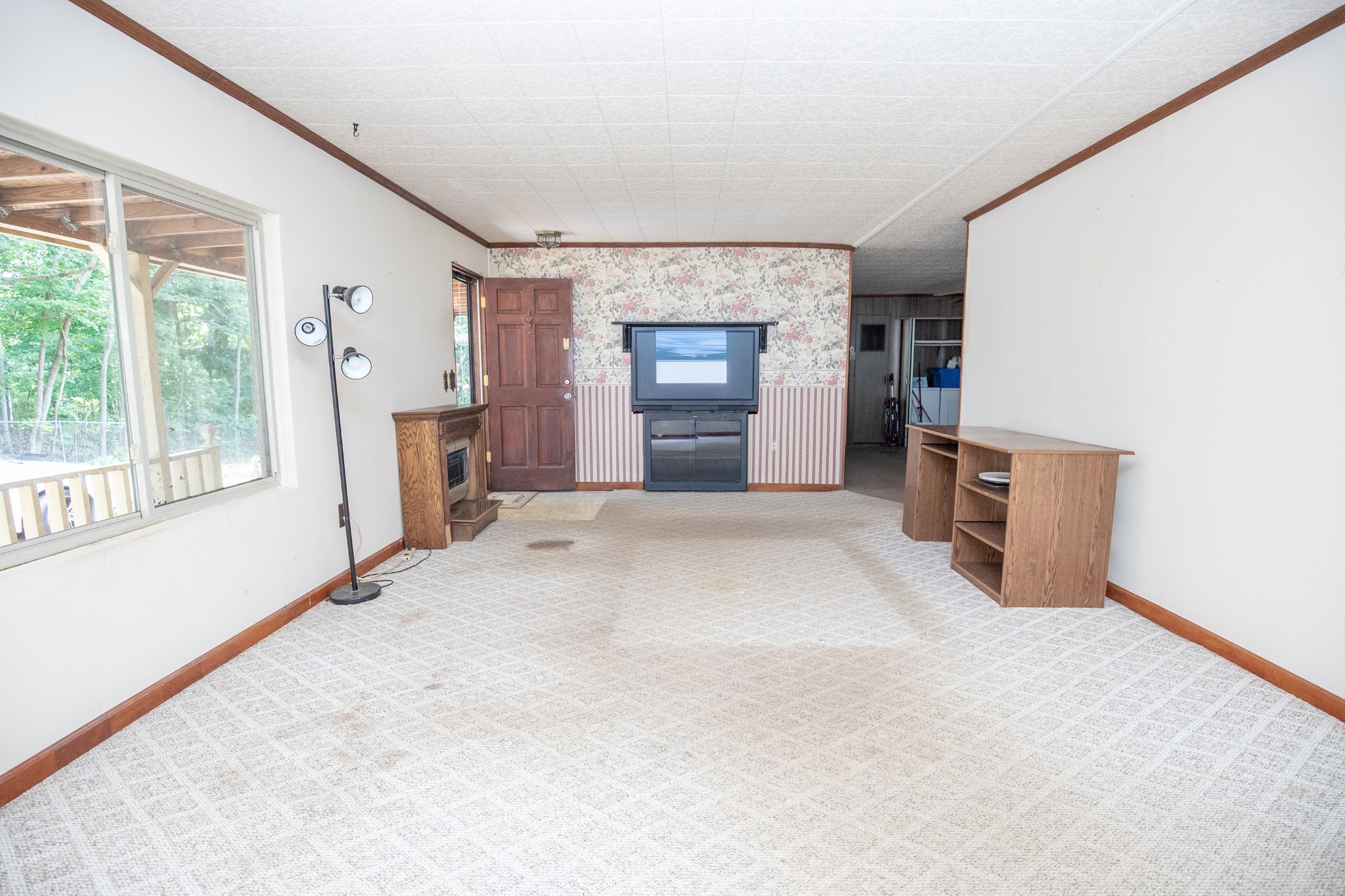 7498 Swift Road Greenbrier, TN 37073 - Photo 18 of 69 a view of a kitchen with a sink and a fireplace
