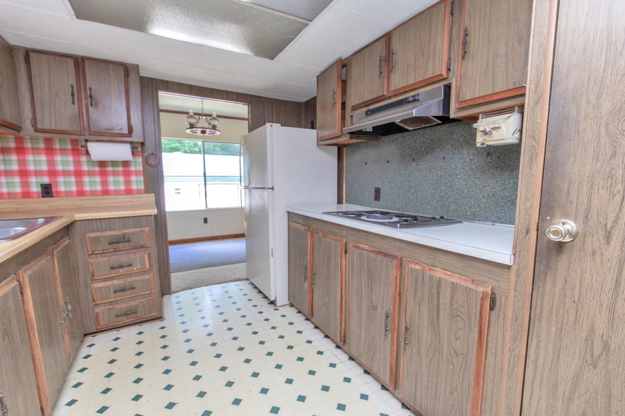 7498 Swift Road Greenbrier, TN 37073 - Photo 23 of 69 a kitchen with stainless steel appliances a cabinets and a stove top oven