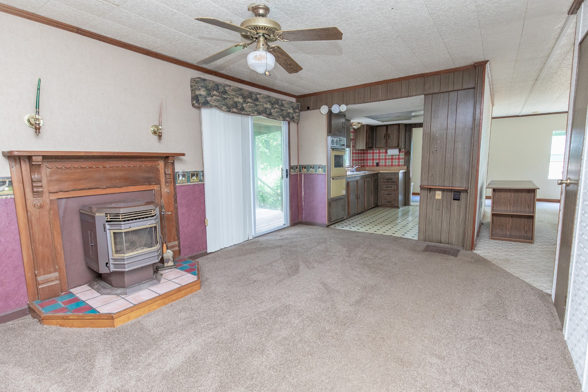 7498 Swift Road Greenbrier, TN 37073 - Photo 26 of 69 a view of a livingroom with a fireplace and cabinet