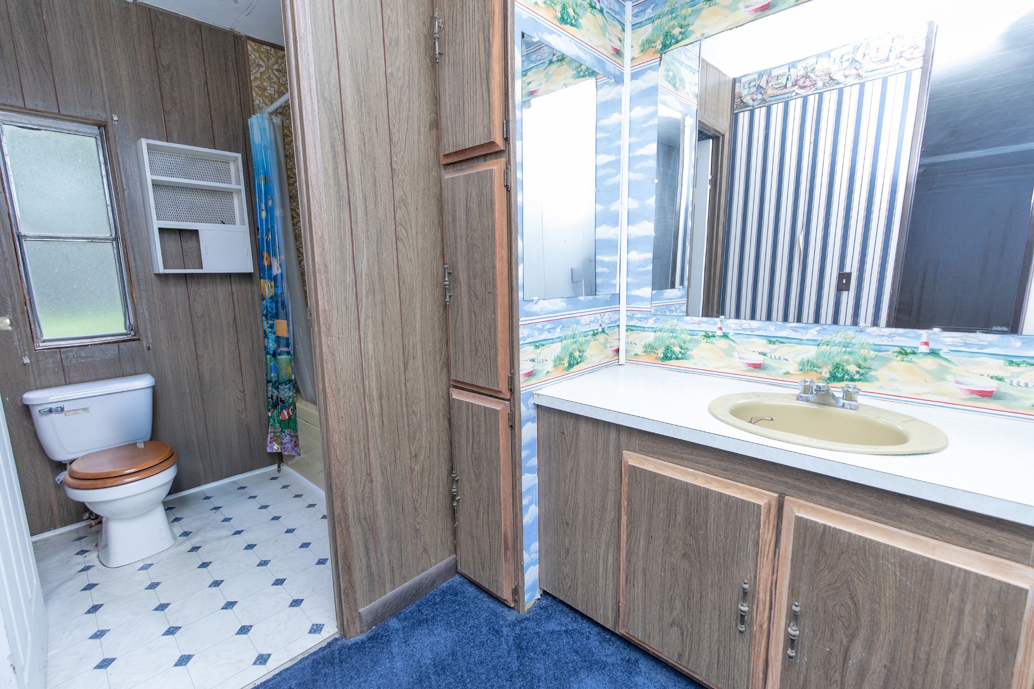 7498 Swift Road Greenbrier, TN 37073 - Photo 30 of 69 a bathroom with a sink a toilet and shower
