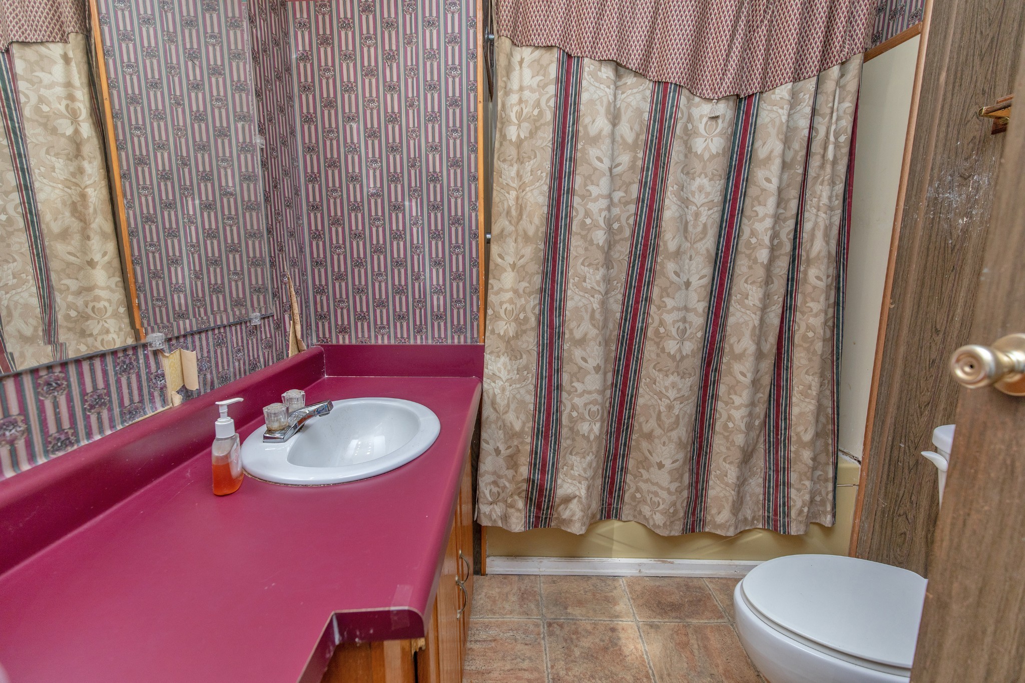 7498 Swift Road Greenbrier, TN 37073 - Photo 32 of 69 a bathroom with a sink toilet and shower