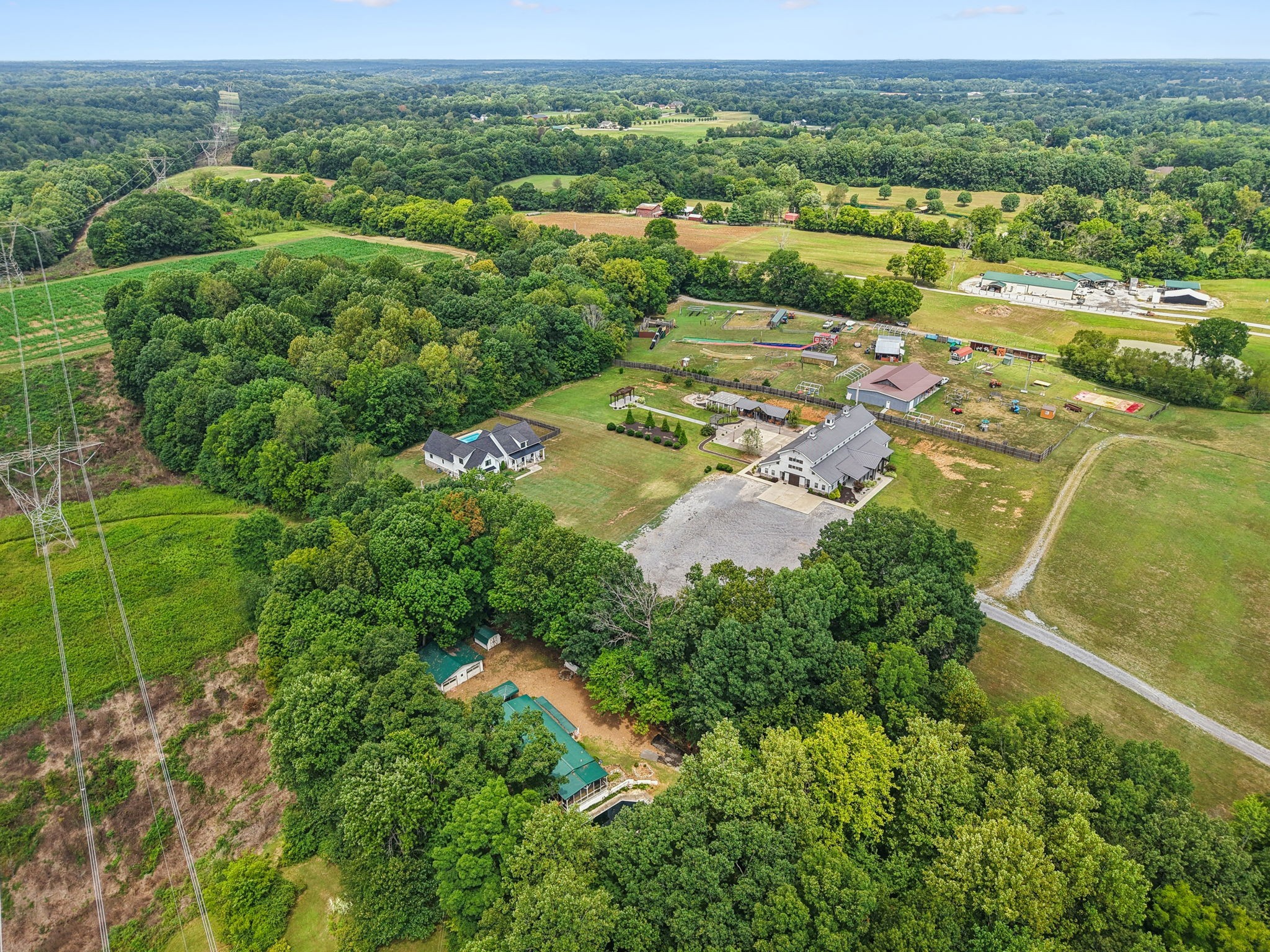 7498 Swift Road Greenbrier, TN 37073 - Photo 4 of 69 an aerial view of residential houses with outdoor space and trees