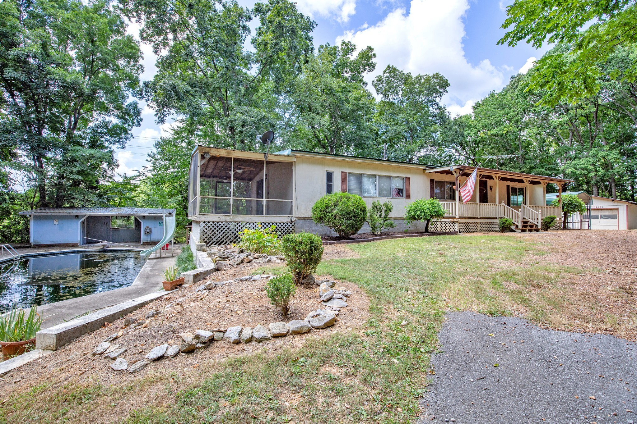 7498 Swift Road Greenbrier, TN 37073 - Photo 44 of 69 a house view with a garden space