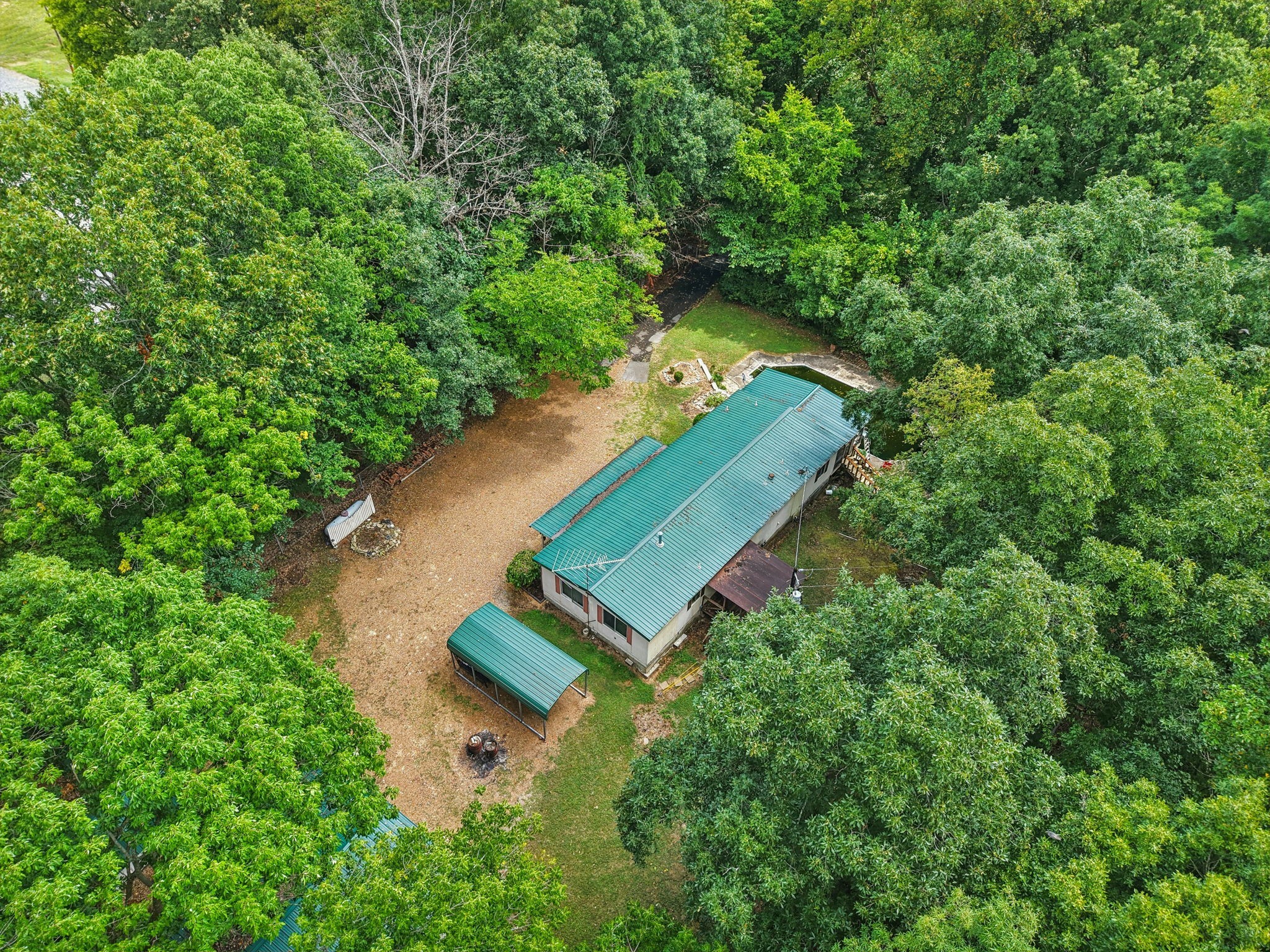 7498 Swift Road Greenbrier, TN 37073 - Photo 5 of 69 an aerial view of a house with a yard and trees