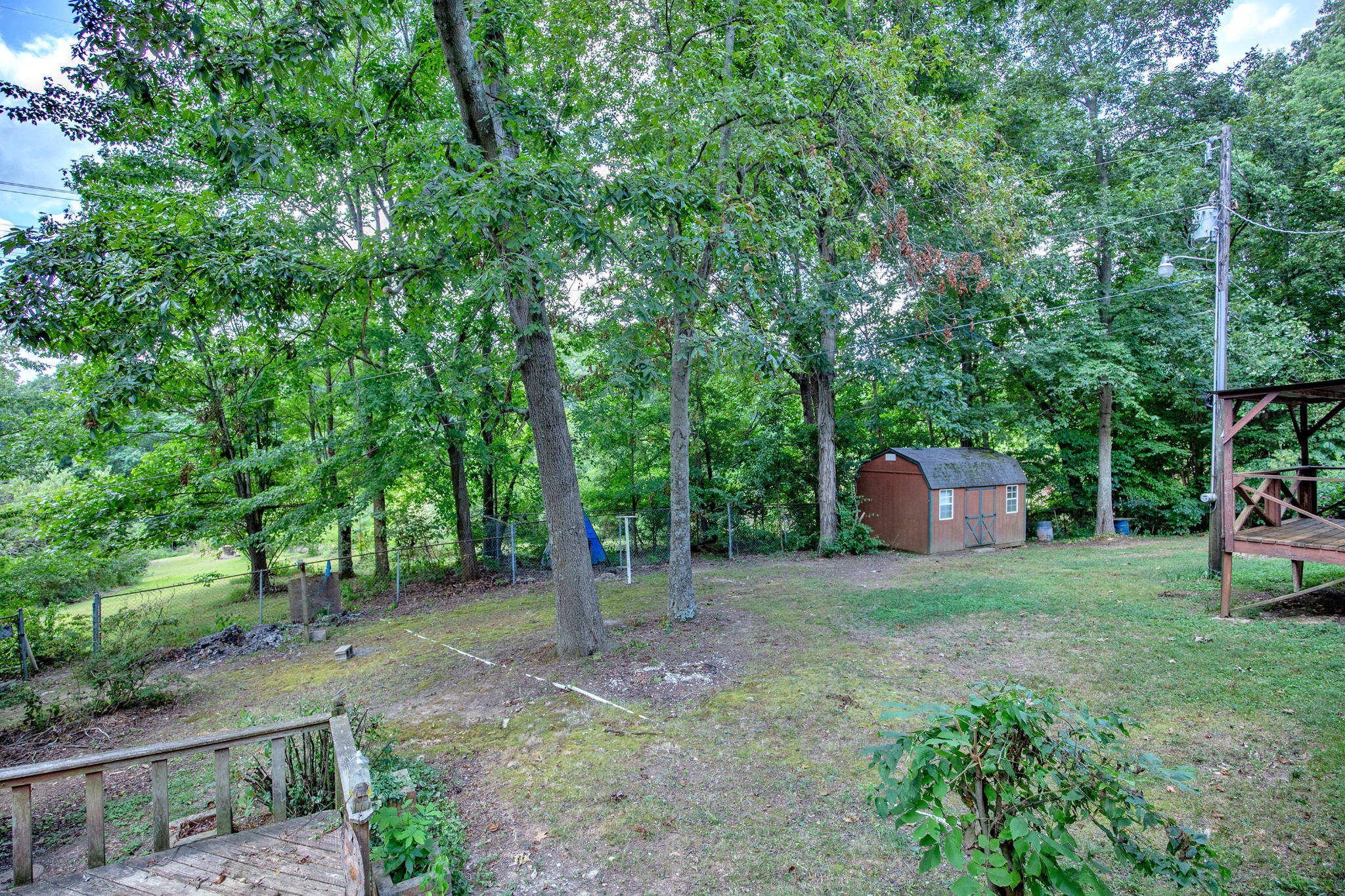 7498 Swift Road Greenbrier, TN 37073 - Photo 55 of 69 a backyard of a house with lots of green space