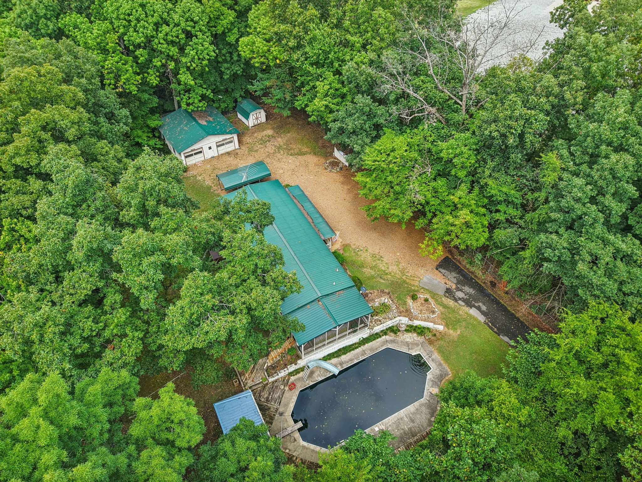 7498 Swift Road Greenbrier, TN 37073 - Photo 61 of 69 an aerial view of residential house with outdoor space and trees all around