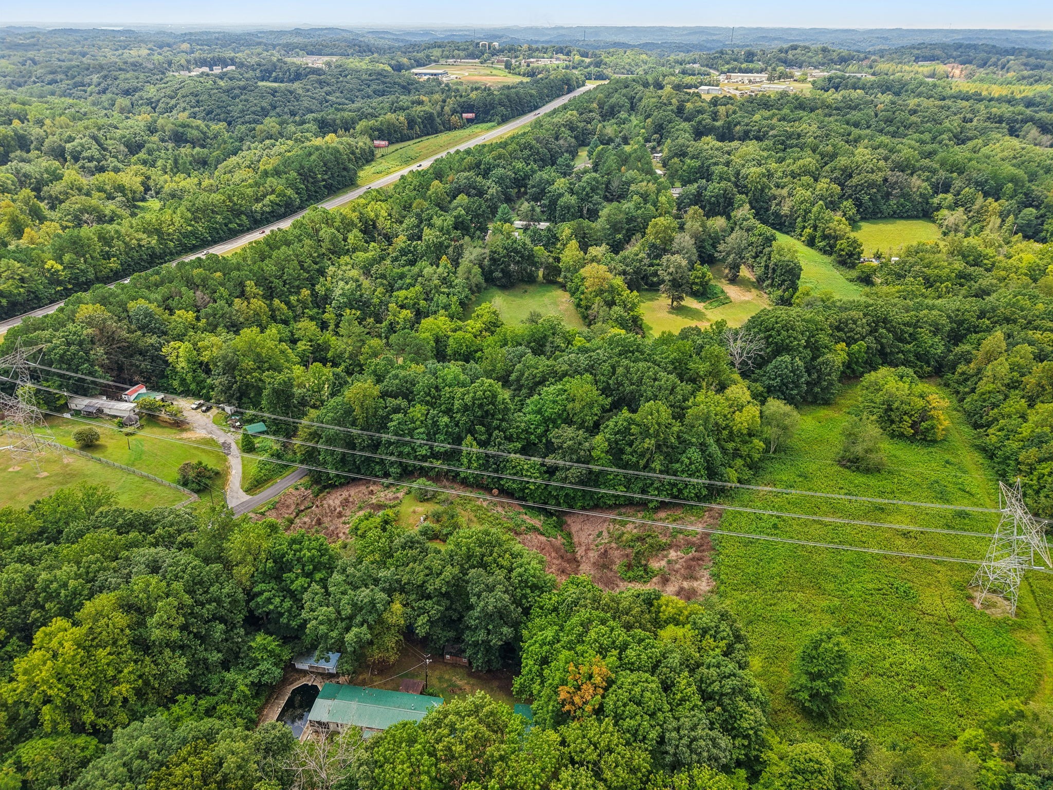 7498 Swift Road Greenbrier, TN 37073 - Photo 64 of 69 an aerial view of residential houses with outdoor space and trees
