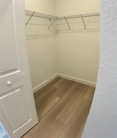 a view of a room with racks on the wall