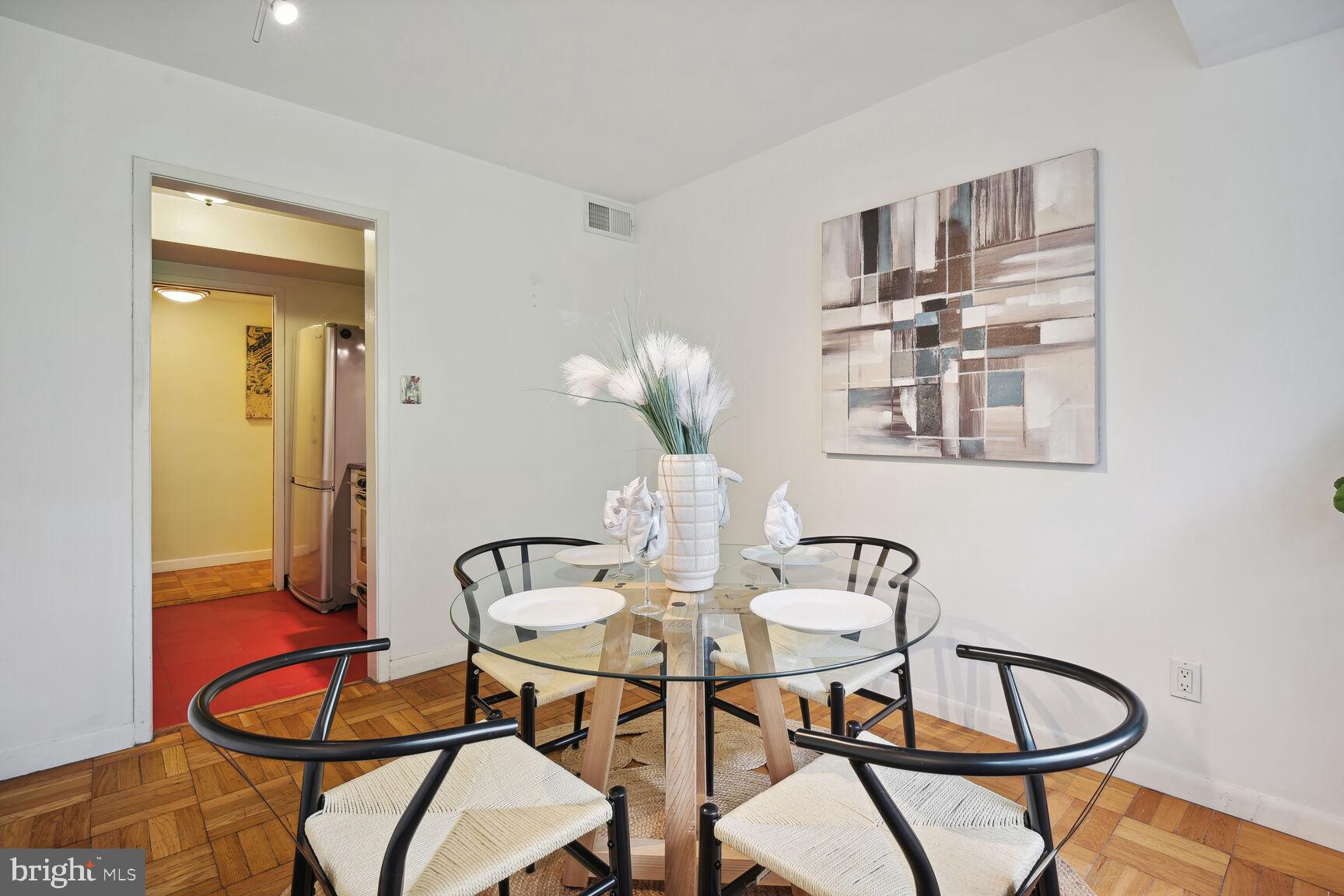3900 Tunlaw Road Northwest, Unit 215 Washington, DC 20007 - Photo 9 of 44 Dining Room opens to Kitchen