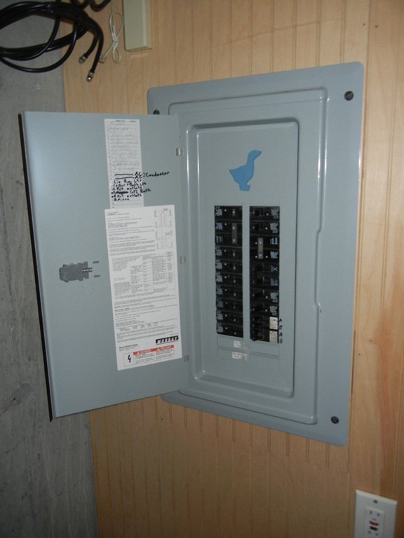 399 Bridge Road, Unit E Northampton, MA 01062 - Photo 16 of 17 a view of a small space with rack on the wall