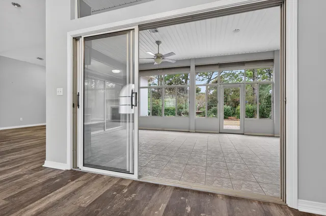 a large kitchen with stainless steel appliances granite countertop a stove and a sink