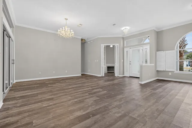 a kitchen with stainless steel appliances granite countertop a stove microwave and refrigerator