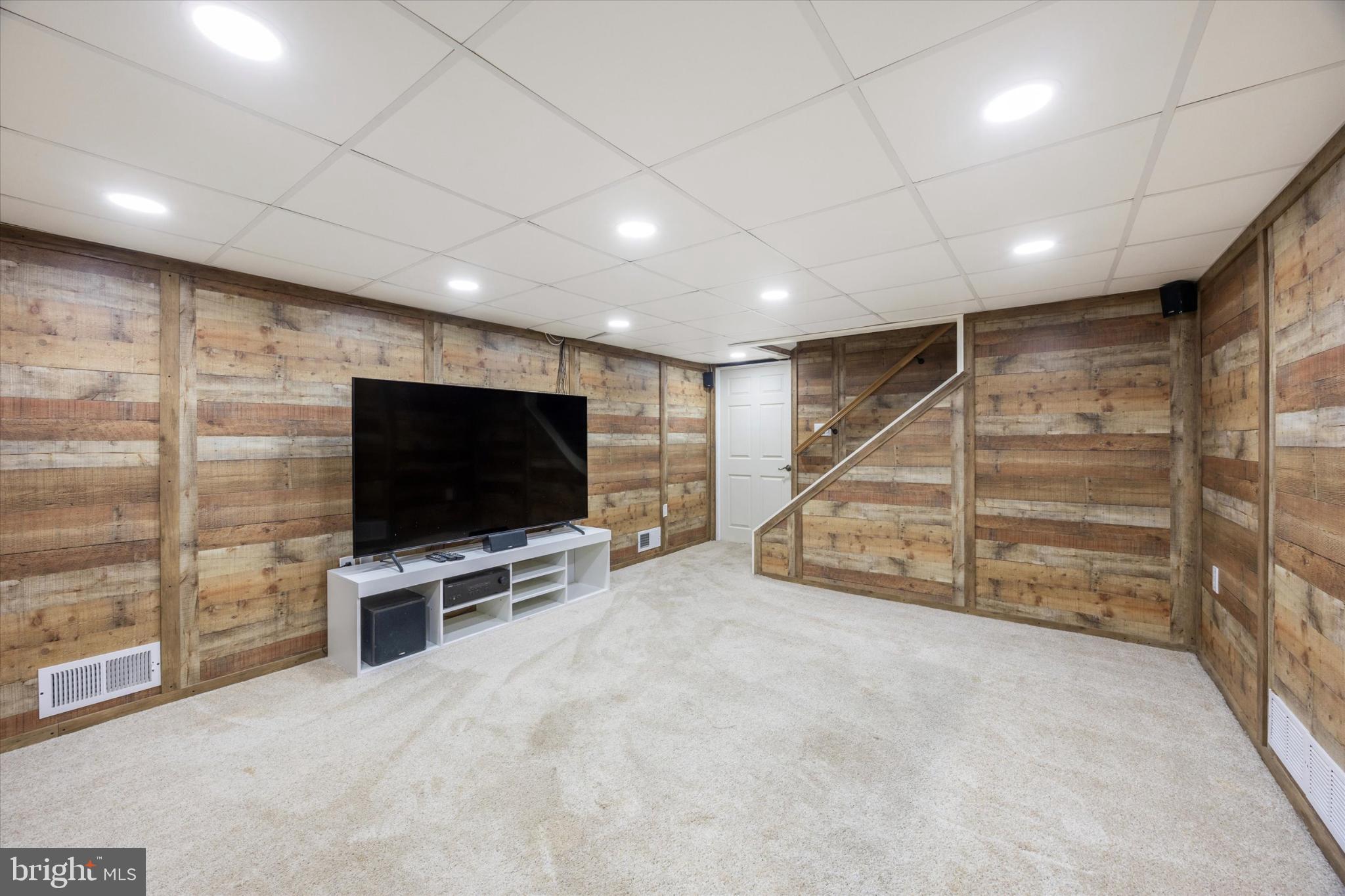 103 Valley Road Wilmington, DE 19804 - Photo 11 of 15 a view of an empty room with a flat screen tv