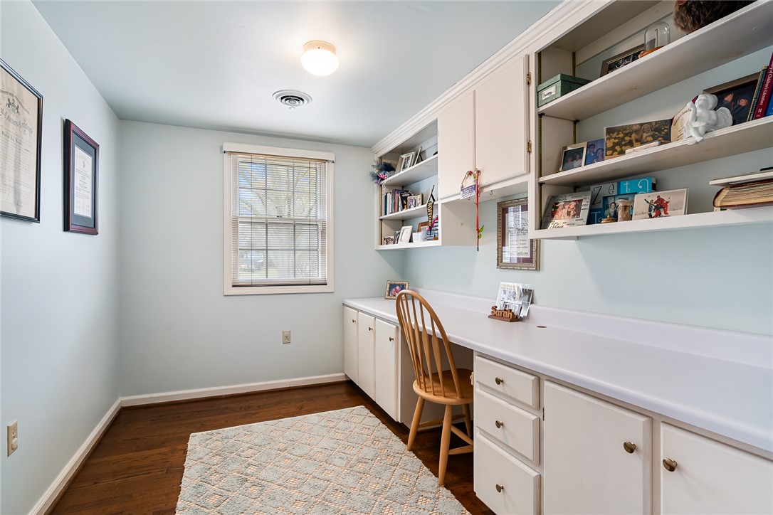 401 Berkshire Hill Anderson, SC 29621 - Photo 24 of 39 This versatile room features ample built-in storage and a functional desk area, perfect for productivity.