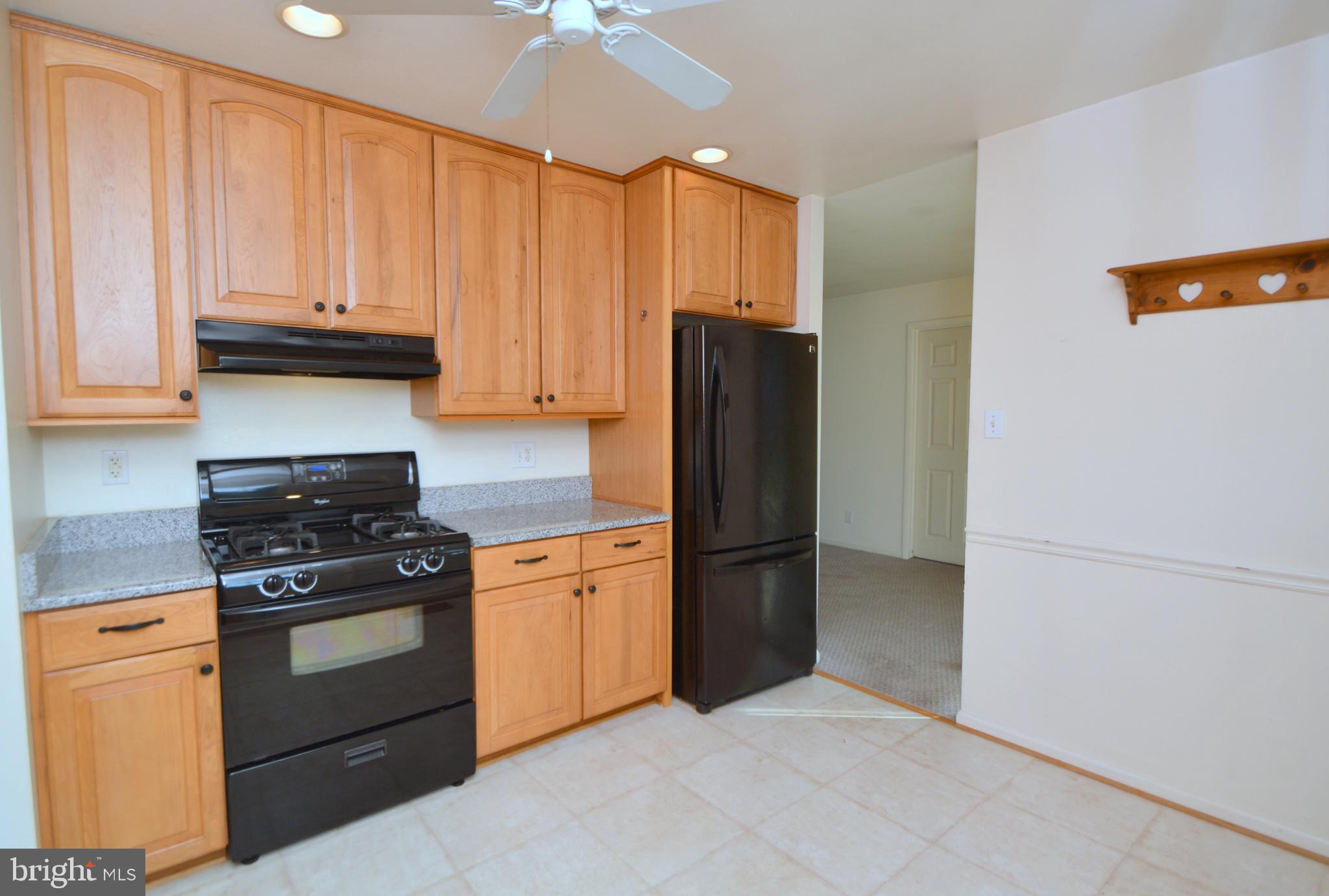607 West Beech Road Sterling, VA 20164 - Photo 17 of 24 Kitchen connects to Dining Room