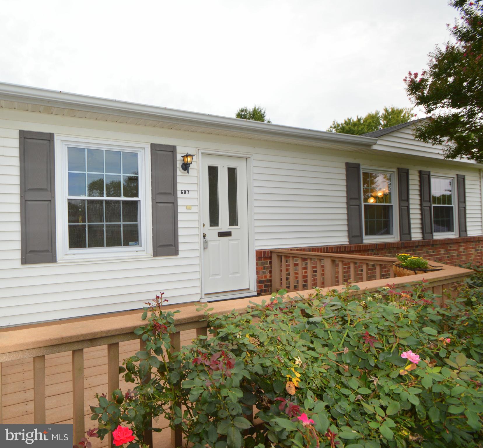 607 West Beech Road Sterling, VA 20164 - Photo 3 of 24 Composite deck & rose garden