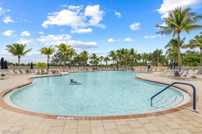 7390 Emilia Lane Naples, FL 34114 - Photo 21 of 25 a view of outdoor space and swimming pool