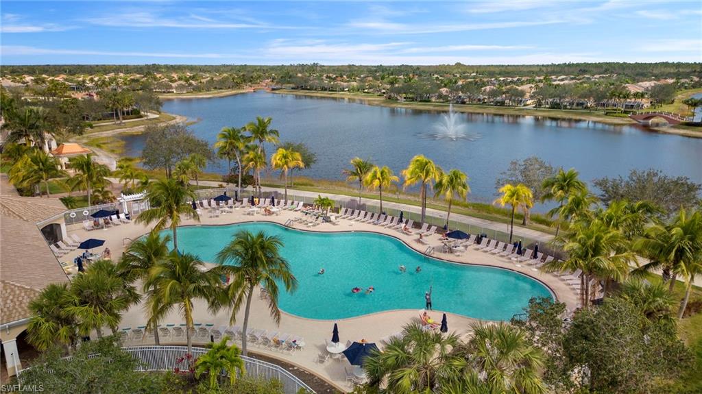 7390 Emilia Lane Naples, FL 34114 - Photo 25 of 25 an aerial view of a city with lots of residential buildings lake and ocean view