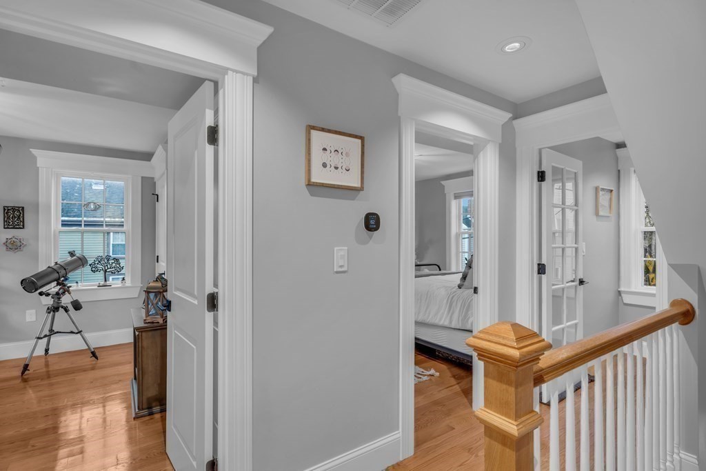 106 Bridge Street, Unit 8 Salem, MA 01970 - Photo 12 of 30 a very nice looking room with wooden floor and a bathroom