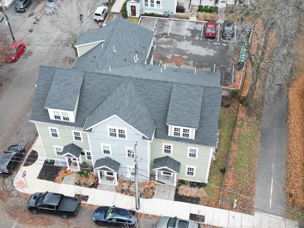 106 Bridge Street, Unit 8 Salem, MA 01970 - Photo 29 of 30 an aerial view of residential houses with outdoor space