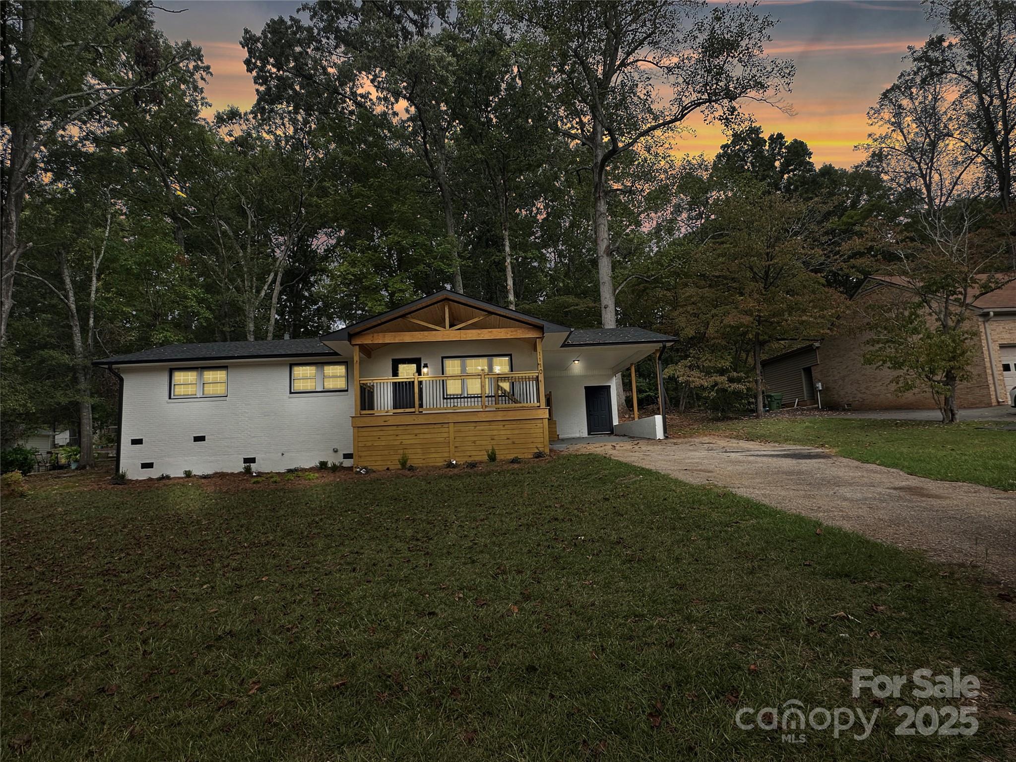 1110 West Edgemont Drive Lancaster, SC 29720 - Photo 2 of 27 a view of a back yard of the house