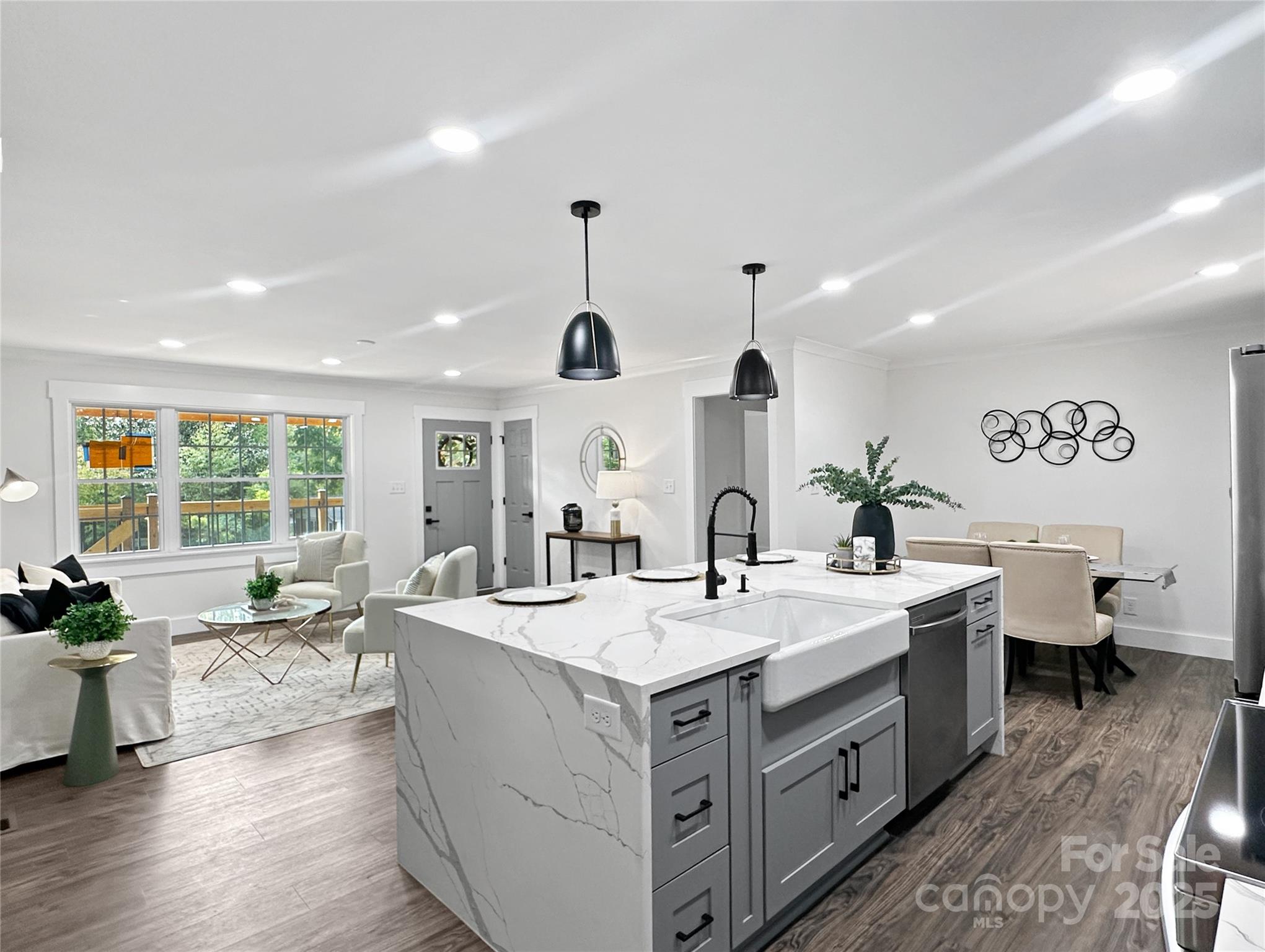 1110 West Edgemont Drive Lancaster, SC 29720 - Photo 7 of 27 a large white kitchen with a large window
