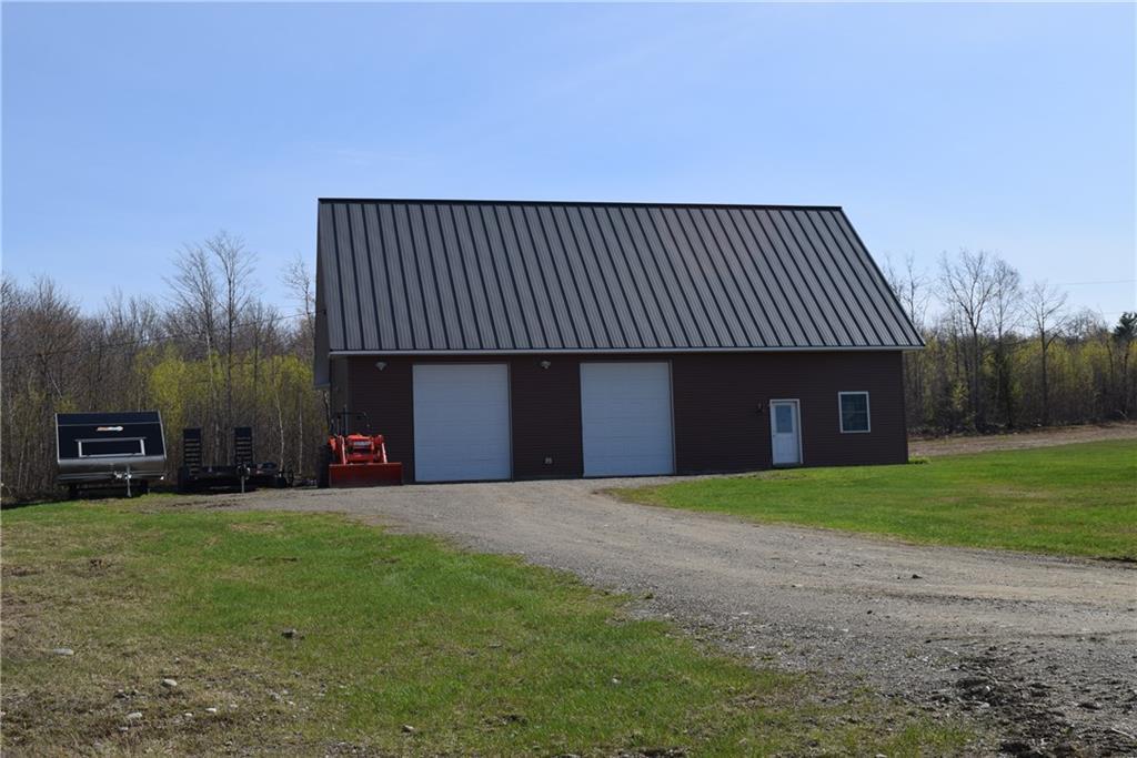 84 Kennard Road Newburgh, ME 04444 - Photo 7 of 35 Oversized garage with area by the...