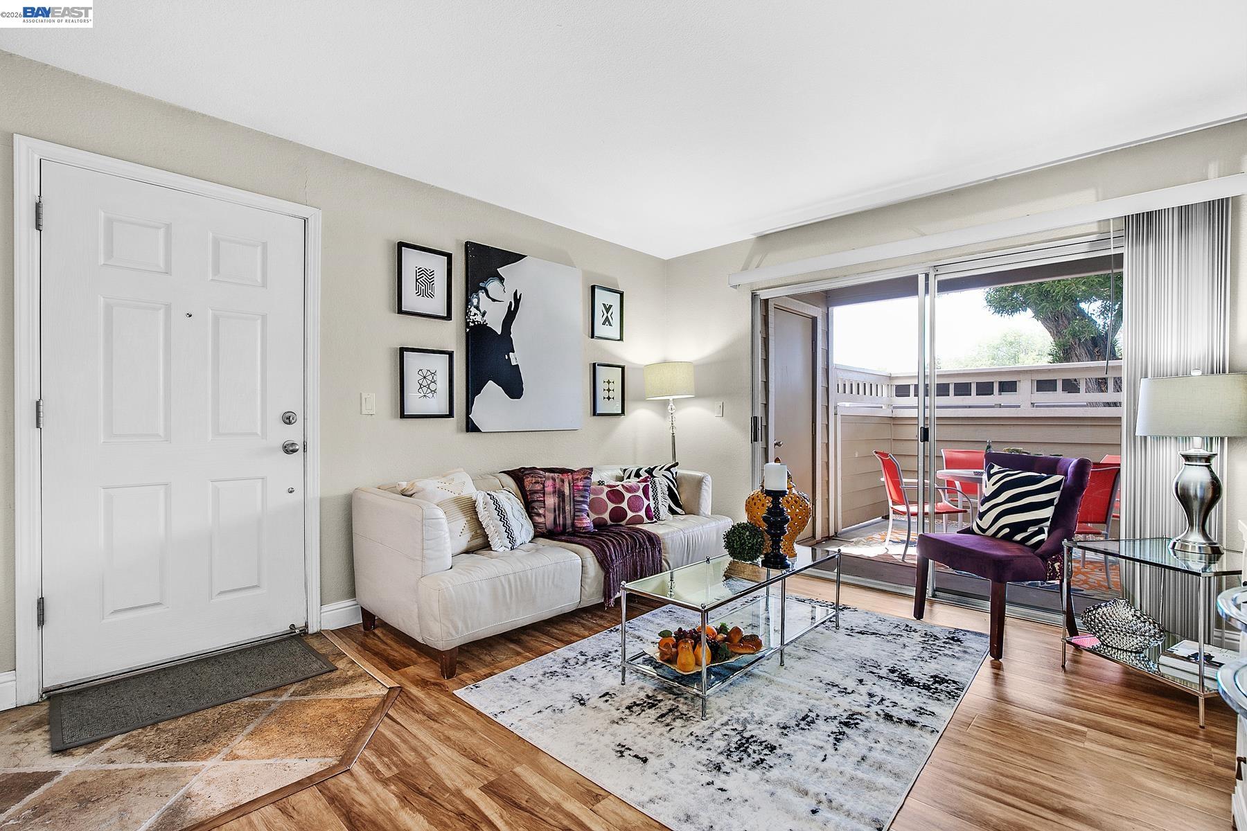 150 Reflections Drive, Unit 13 San Ramon, CA 94583 - Photo 7 of 33 a living room with furniture and a rug