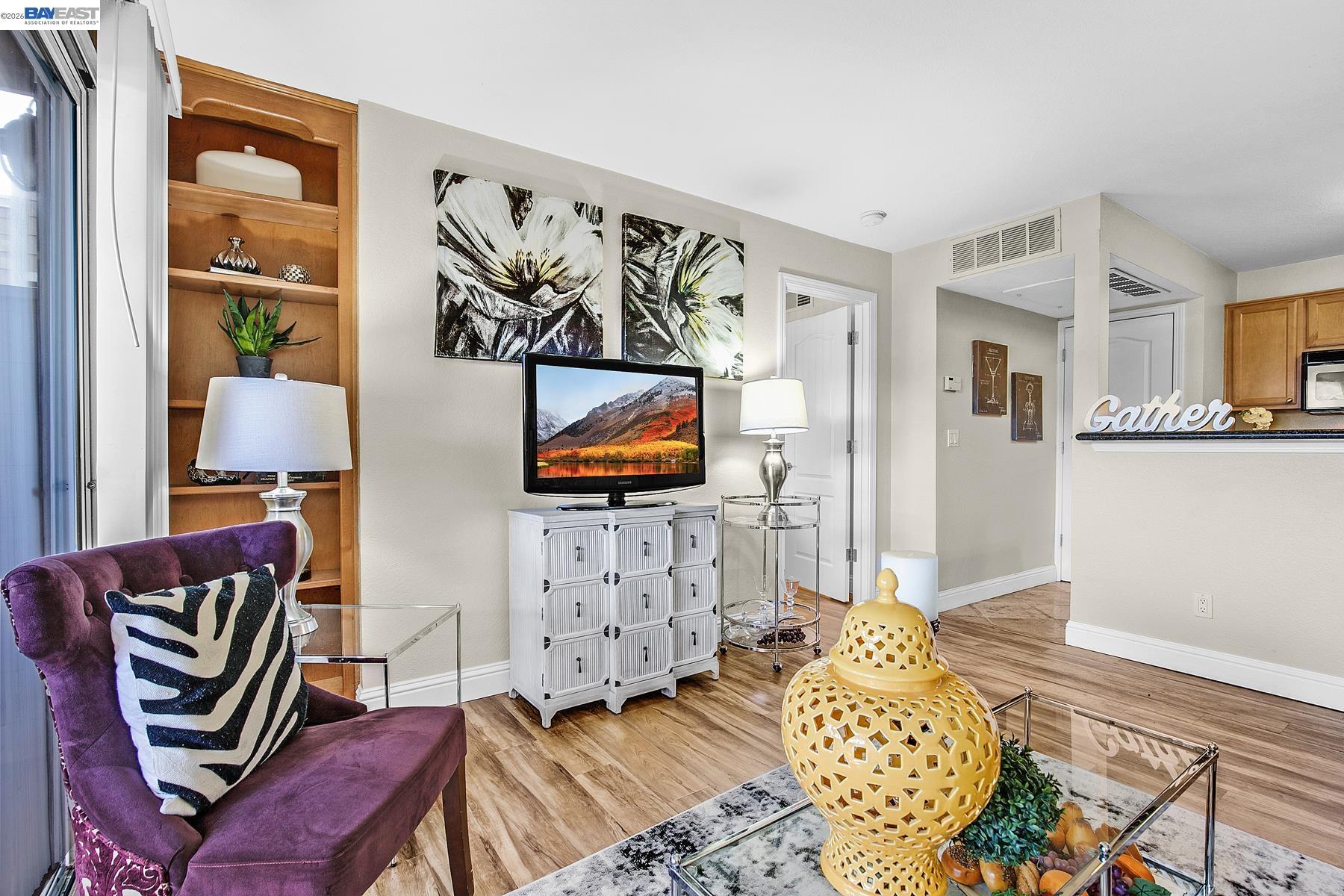 150 Reflections Drive, Unit 13 San Ramon, CA 94583 - Photo 8 of 33 a bedroom with furniture and wooden floor