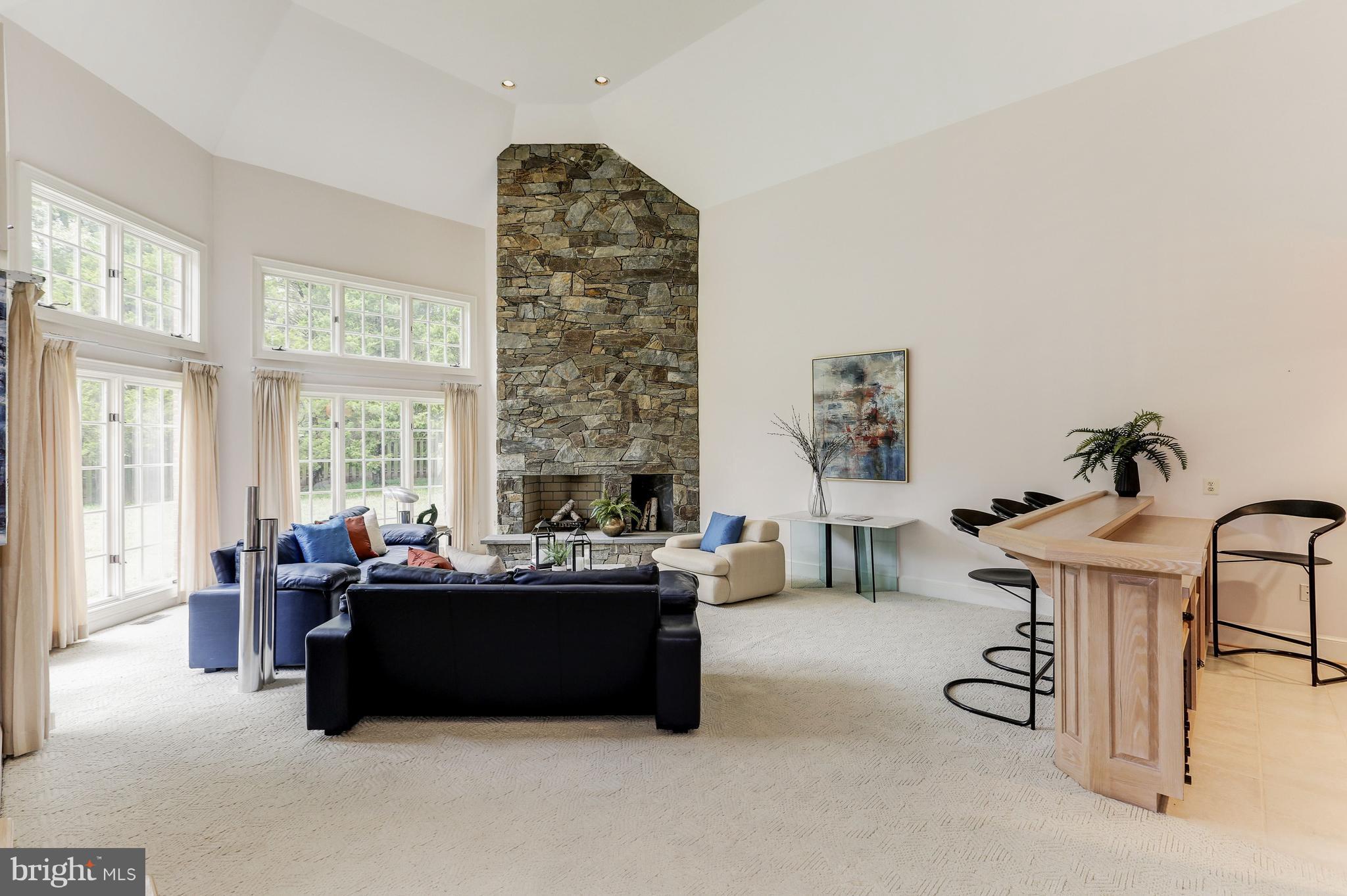 10111 South Glen Road Potomac, MD 20854 - Photo 22 of 36 Floor To Ceiling Stone Fireplace