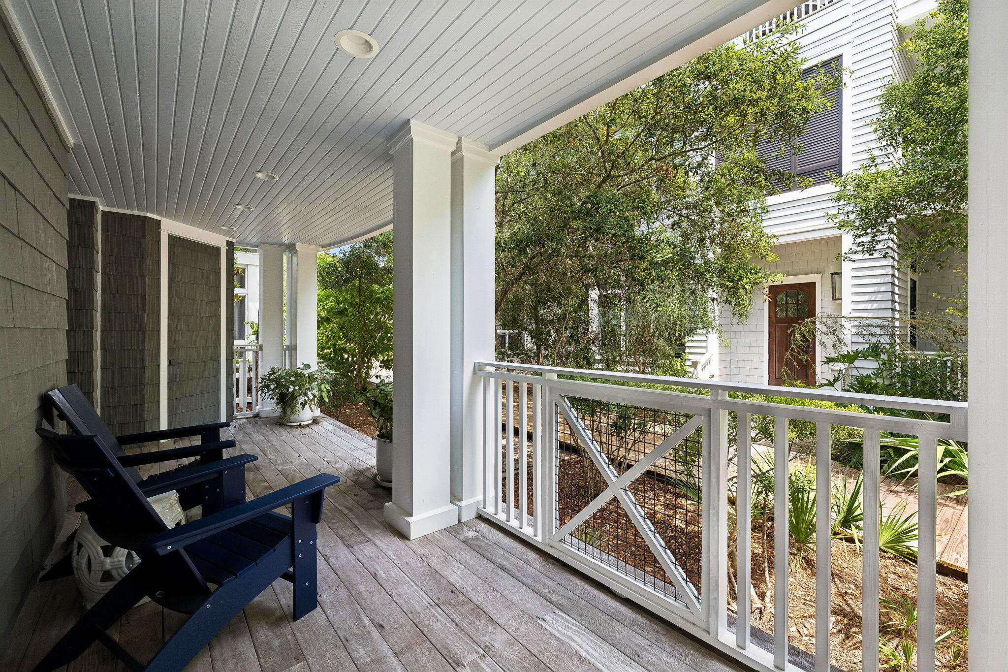51 Shingle Lane Inlet Beach, FL 32461 - Photo 62 of 71 a view of a balcony with wooden floor and furniture