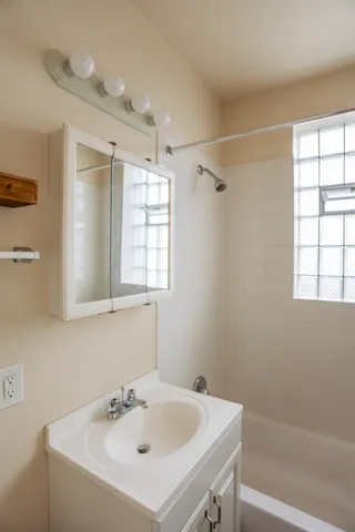 a bathroom with a sink and a bathtub