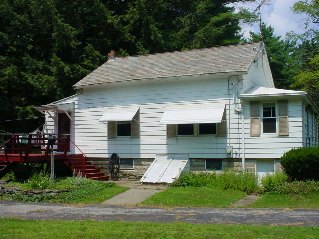 1330 Wade Inn Road Becket, MA 01223 - Photo 14 of 17 a view of a house with backyard