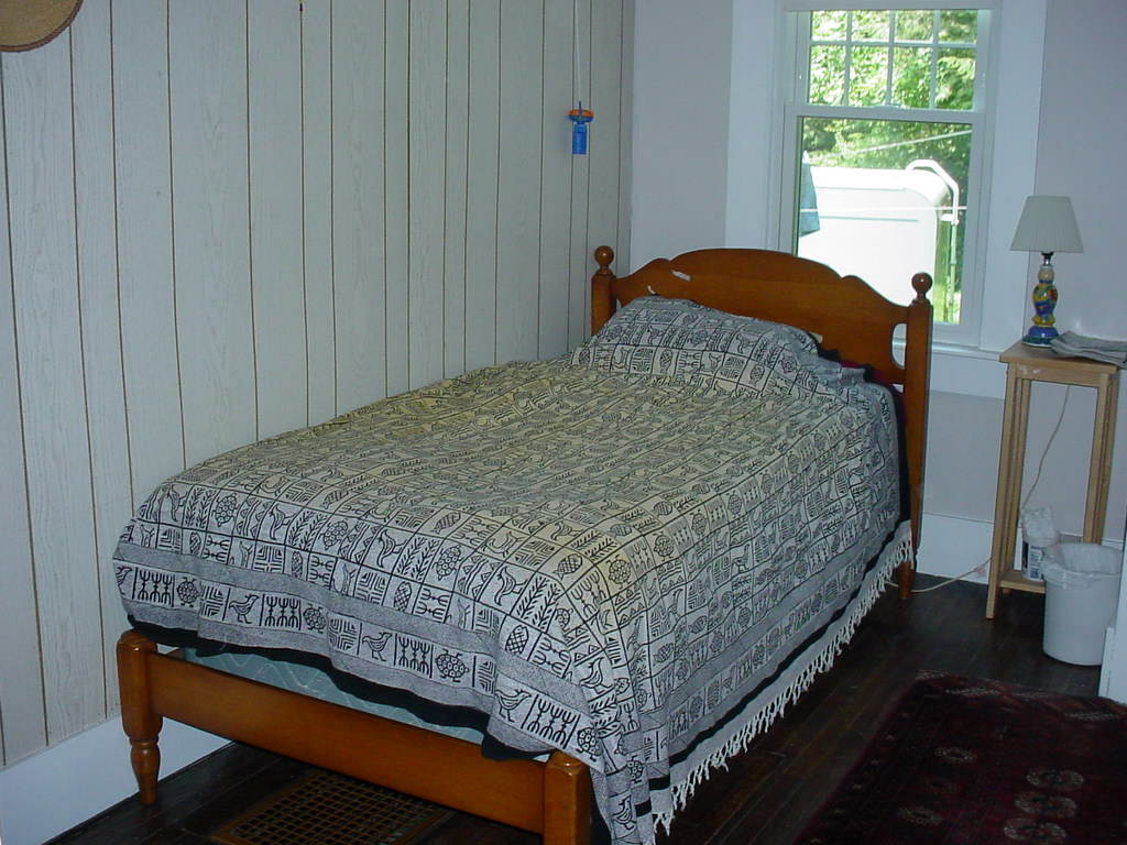 1330 Wade Inn Road Becket, MA 01223 - Photo 6 of 17 a bedroom with a bed and a window