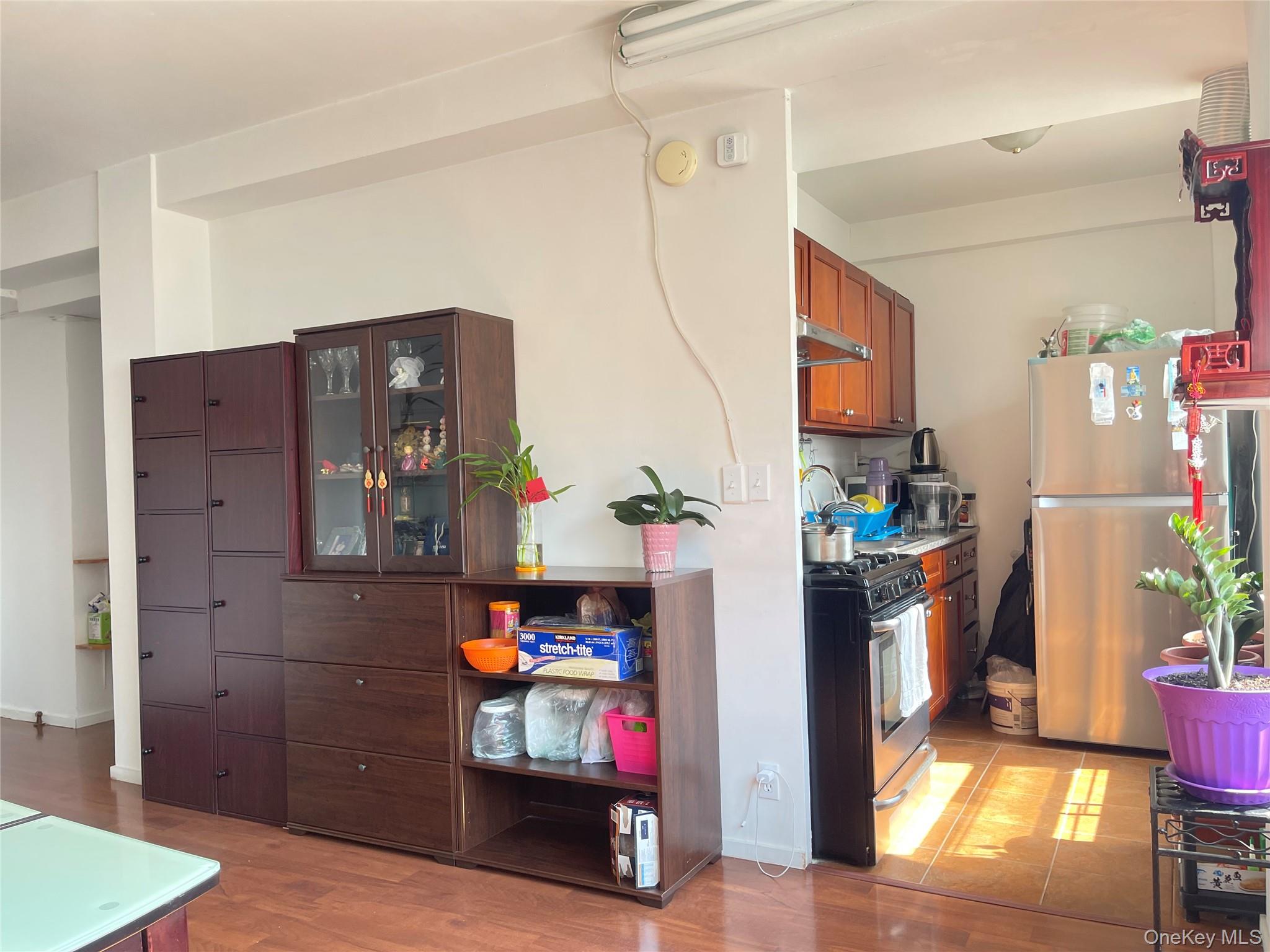 99-72 66th Road, Unit 9S Queens, NY 11374 - Photo 6 of 9 a view of living room and utility room