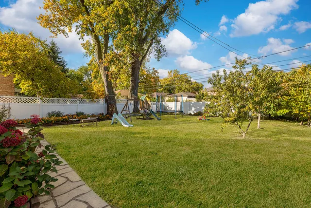 a view of yard with outdoor seating